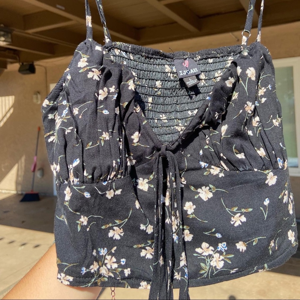 floral tank top size large, runs small!